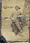 Tintype of African American Gentleman Seated on Stool [n.d.]