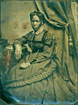 Small Tintype of Young Black Woman, Seated [n.d.]