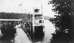 Armour Steamboat Sitting at a Dock with People Boarding, circa 1930