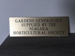 Photo of a Plaque Commemorating a Donation to the Niagara on the Lake Public Library from the Niagara Horticultural Society.