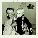 Photograph of a man and child