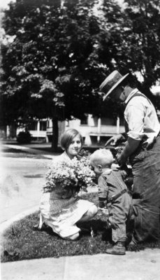 Family Smelling Flowers