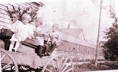 Albert, Margaret, Dorothy, and Leo Linke in Buggy