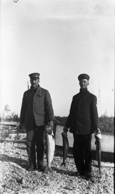 Middle Island:  George Hartlep and Crew Mate with Fish