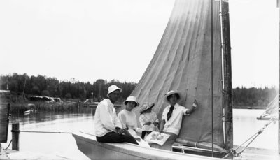 Middle Island:  Family on Sailboat at Dock