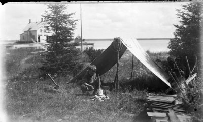 Middle Island:  Donald Hartlep &quot;Camping&quot; with Boathouse in Background