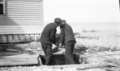 Middle Island:  Surfmen Moving Rocks