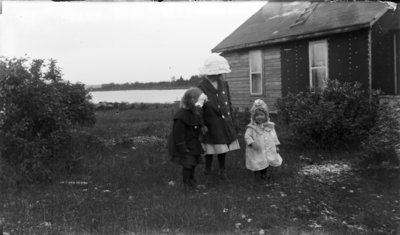 Middle Island:  Esther Hartlep (right) with two unidentified girls.