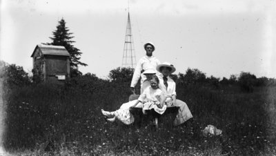 Middle Island:  Esther Hartlep (front with her mother, Lillian (right) with two unidentified people.