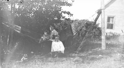 Middle Island:  Esther Hartlep (front) with brother, Don, and mother, Lillian.