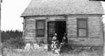 Middle Island:  Esther Hartlep and her mother, Lillian (left) with unidentified others.