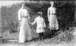 Middle Island:  Esther Hartlep (center) holding hands with her mother, Lillian, and unidentified teenage girl.
