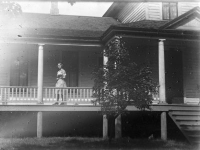 Esther Hartlep on Porch of Family Home at 227 W. Lewis Street in Alpena, Michigan