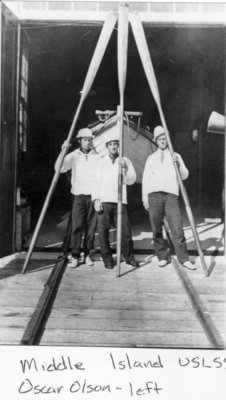 Middle Island:  Crew in front of Surfboat Building