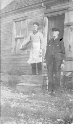 Middle Island: Oscar Olson (left) and &quot;Ferguson&quot; on cooking duty