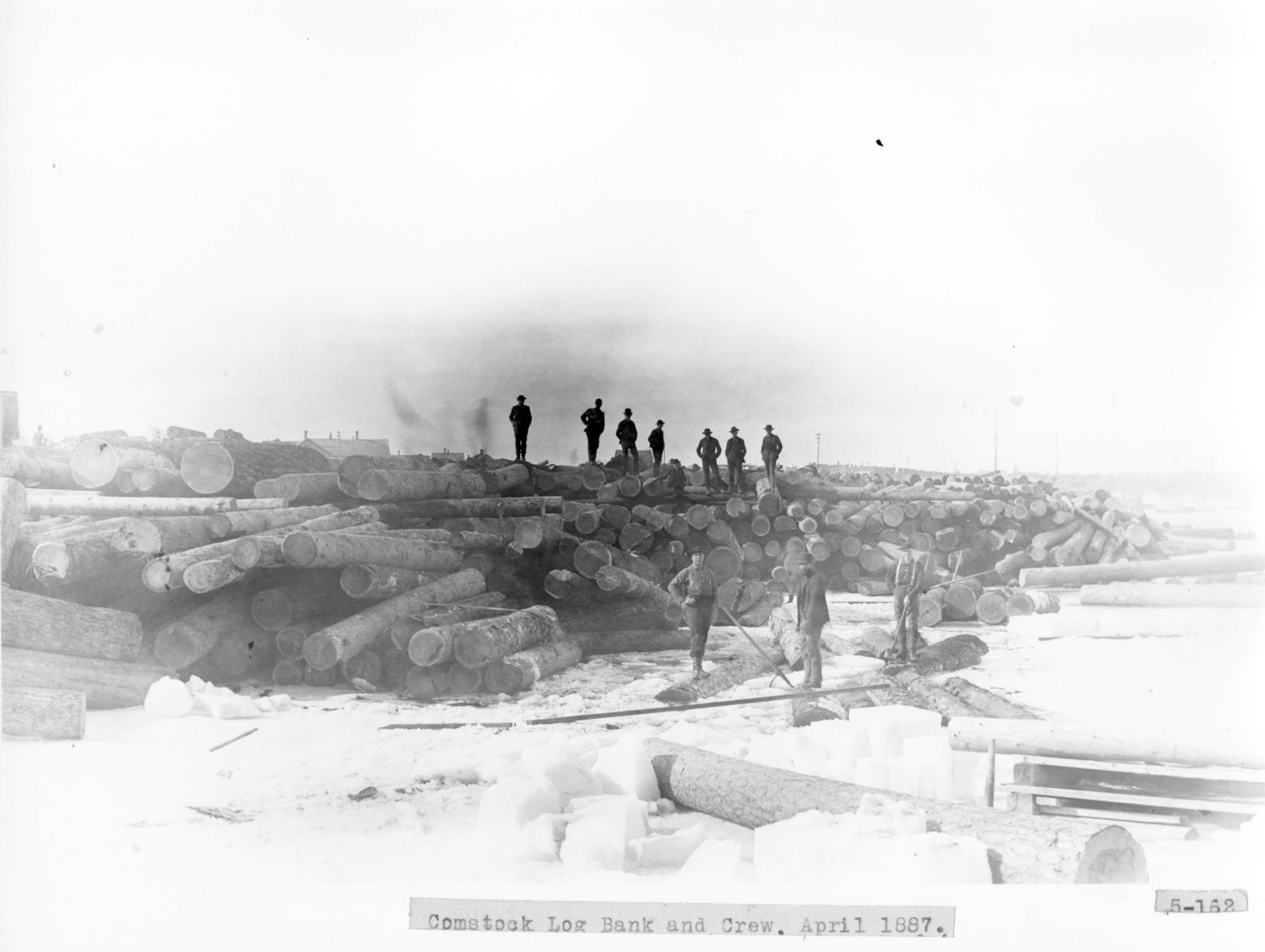 comstock-lumber-mill-log-bank-on-thunder-bay-river-northeast-michigan