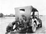 002 Soldiers fixing Jeep