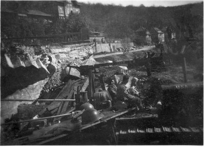 029 Soldiers on construction equipment near damaged village