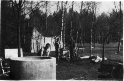 058 Three soldiers in camp