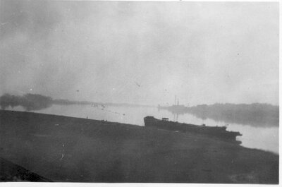 088 Barge on river shore