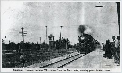 Passenger train approaching the CPR station in Brighton, Ontario