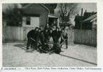 Boys playing hockey on outdoor rink-1941 or 1942. Probably in Brighton, Ontario.