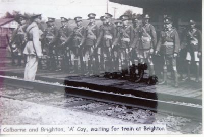 Colborne and Brighton 'A' Company waiting for train at Brighton train station