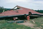 Tornado damage to Ross Philip's barn, 99 Sanford Street, Brighton, Ontario