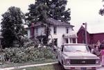 Cleaning up after the Brighton Tornado on July 13, 1973.