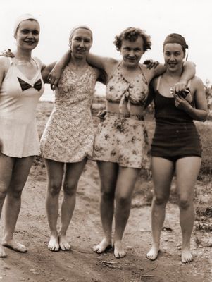 Four women in swimwear at a swimming beach, June 1945.  Reverse inscription: June/45 - Alice, Audrey, Anna, Joye Daniels