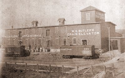 Storage buildings for W. C. Butler's Apple Storage and W.C. Butler's Grain Elevator in Brighton, Ontario.