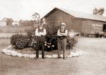 Mr. Hare and son, Percy Hare, at the railway station in Brighton, Ontario.