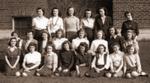 A large group of high school-aged girls in front of a school on May 2, 1944.