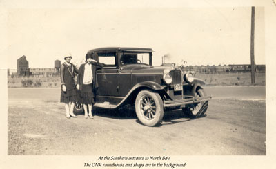 A Car and Two Women at the Southern Entrance to North Bay, circa 1920