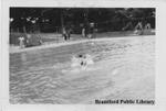 Young Woman Splashes in the Pool at Earl Haig