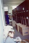 Staff Members Help Pack up the Brantford Public Library Carnegie Branch During the Move to the New Branch