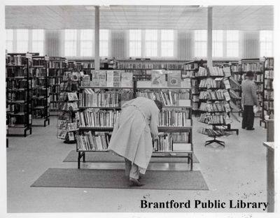 Patron Browses at the Brantford Public Library, Carnegie Building