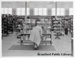 Patron Browses at the Brantford Public Library, Carnegie Building