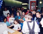 A Group of Children Watch a Young Girl Use a Computer at the Brantford Public Library