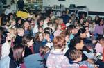 An Audience of Children Watch Erick Traplin Perform at the Brantford Public Library