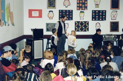 Magician Peter Mennie Performs for a Group of Children at the Brantford Public Library