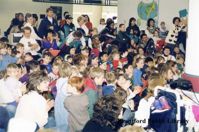 An Audience Watches Magician Peter Mennie Perform at the Brantford Public Library