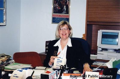 Wendy Newman, former CEO of the Brantford Public Library at her Desk