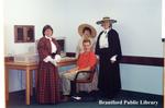 Unknown Staff Members and Wendy Newman During City of Brantford Sesquicentennial Celebrations at the Brantford Public Library