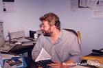 Brantford Public Library Staff Member, Chris Stanley at his Desk