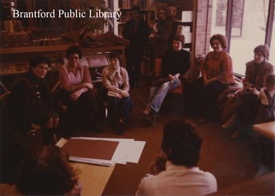 Library Staff and Patrons Having a Discussion at the St. Paul Avenue Branch of the Brantford Public Library, Undated