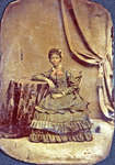 Tintype of Young African American Woman Seated at Table [n.d.]