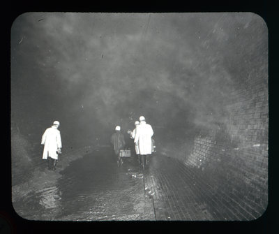 Canadian Niagara Power Company Glass Slide - Group of men walking through the hydro tunnel