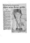 Akey wins three golds