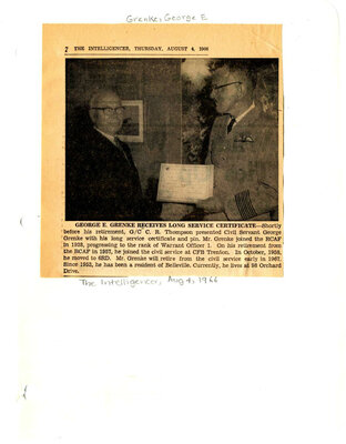 George E. Grenke receives long service certificate